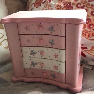 This is an antique rosey pink shelf
